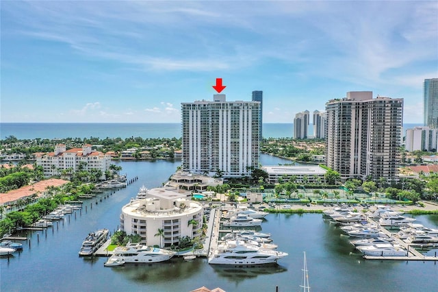 birds eye view of property with a water view