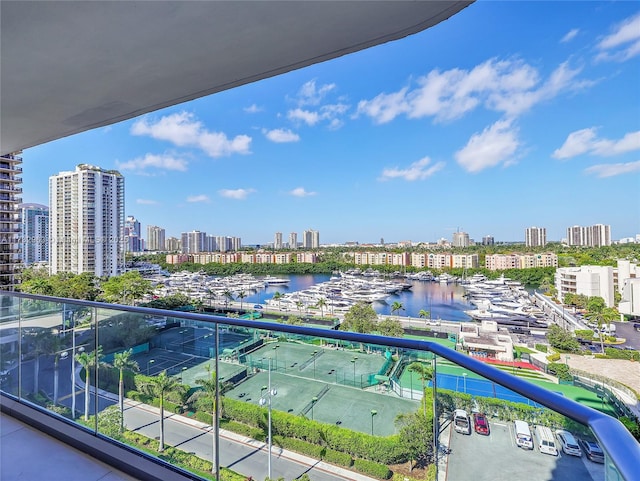 balcony featuring a water view