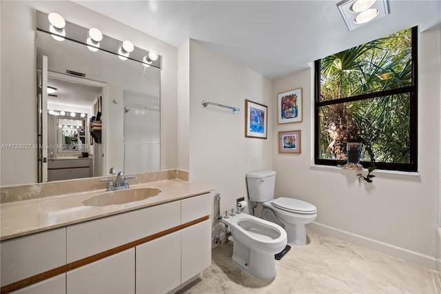 300 Three Islands Blvd Unit 102, Hallandale Beach, FL 33009 - full bathroom with a bidet, vanity, toilet, marble look tile flooring, and baseboards