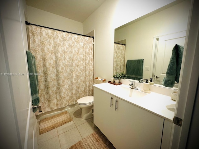 bathroom featuring vanity, curtained shower, tile patterned floors, and toilet