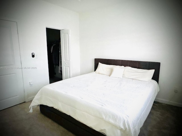 carpeted bedroom featuring a closet