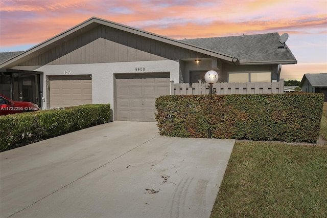 view of front of home with a garage