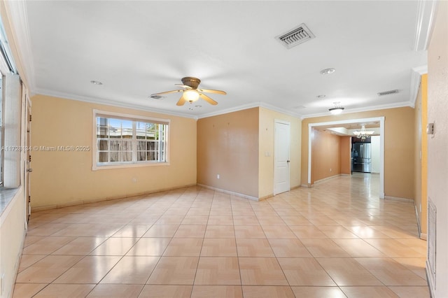 spare room with crown molding and ceiling fan with notable chandelier