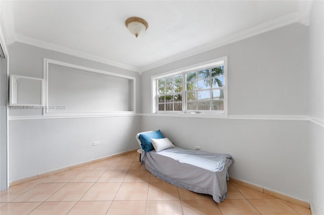 bedroom with ornamental molding and light tile patterned flooring