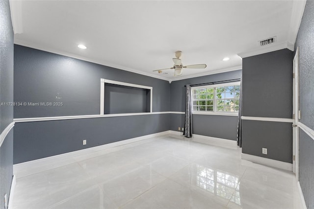 tiled spare room with crown molding and ceiling fan