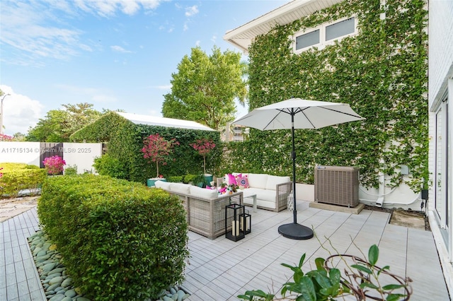 view of patio with an outdoor hangout area and central AC