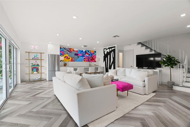 living room with light parquet floors