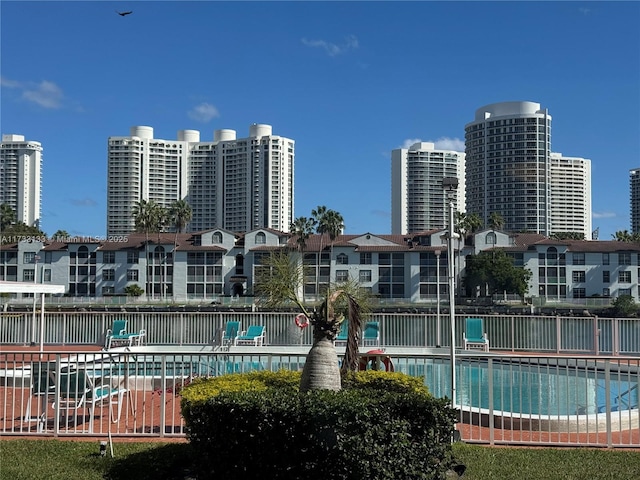 view of swimming pool featuring central air condition unit