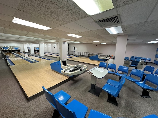 interior space featuring a paneled ceiling