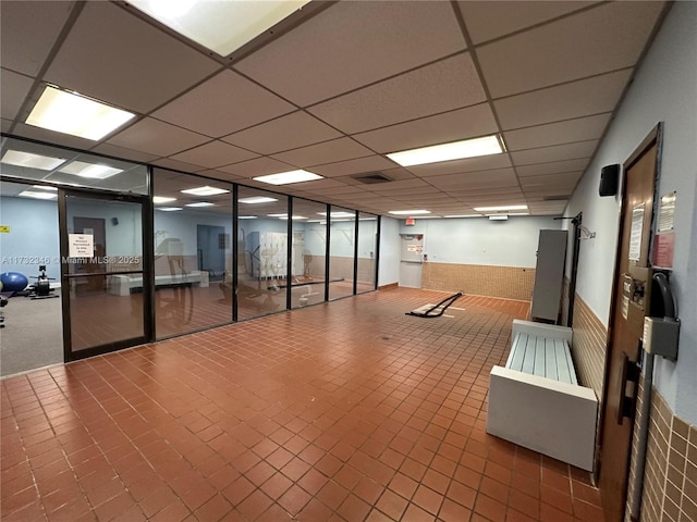 exercise area with a drop ceiling