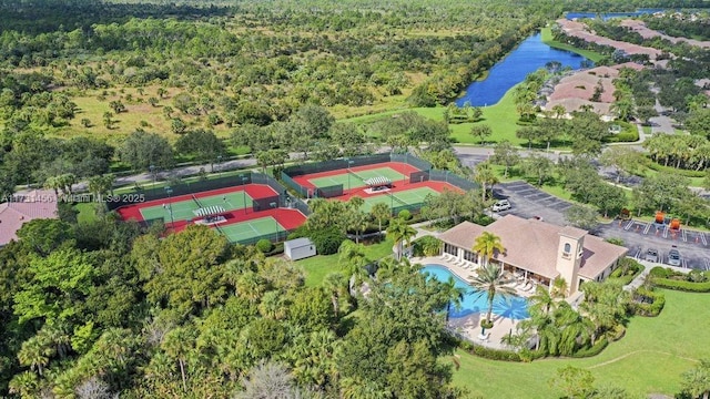 birds eye view of property featuring a water view