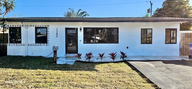 view of front of home with a front yard