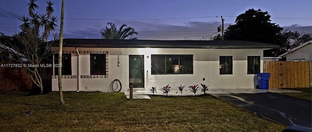 view of front of home featuring a yard