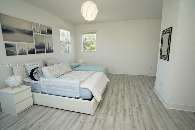 bathroom with tile patterned floors, vanity, and plus walk in shower