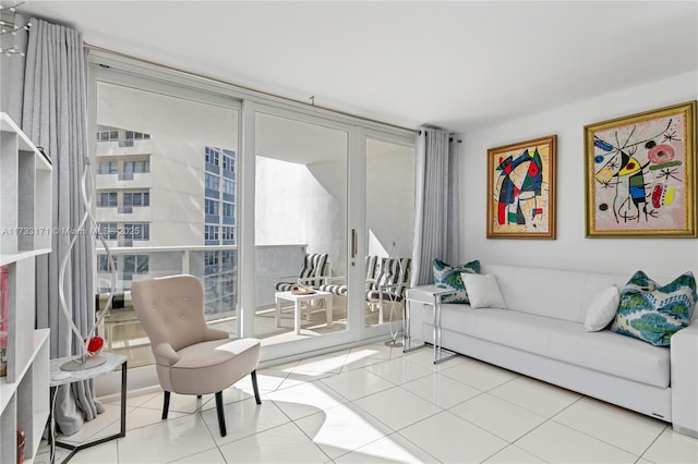 tiled living room with a wall of windows