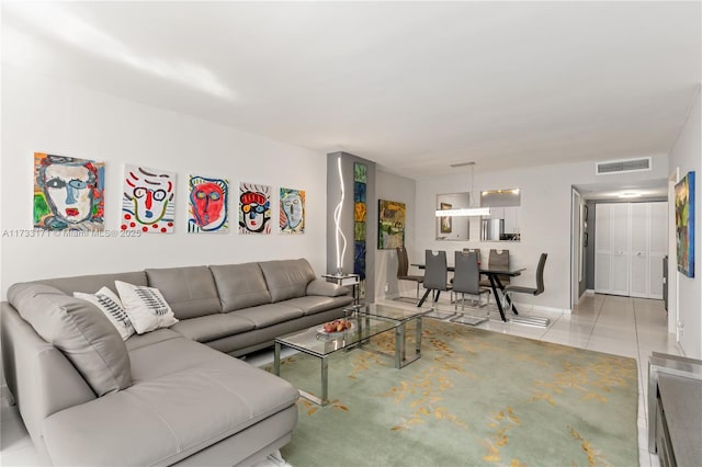 living room featuring light tile patterned floors