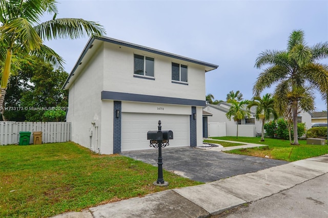 front facade with a garage and a front yard