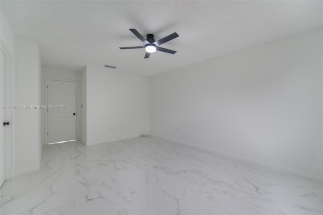 unfurnished room with ceiling fan