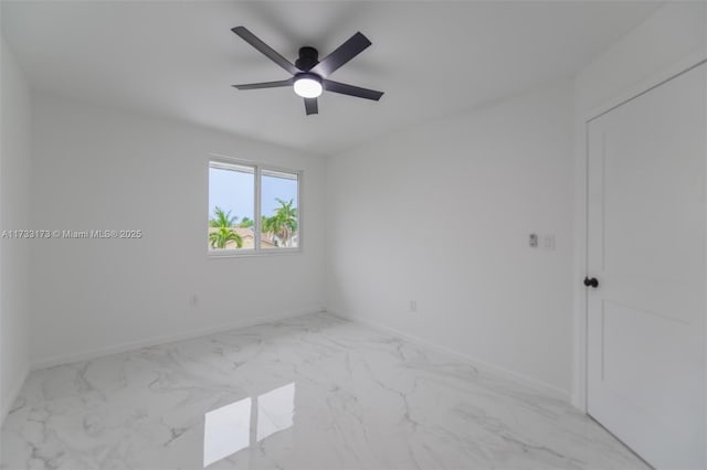 empty room featuring ceiling fan