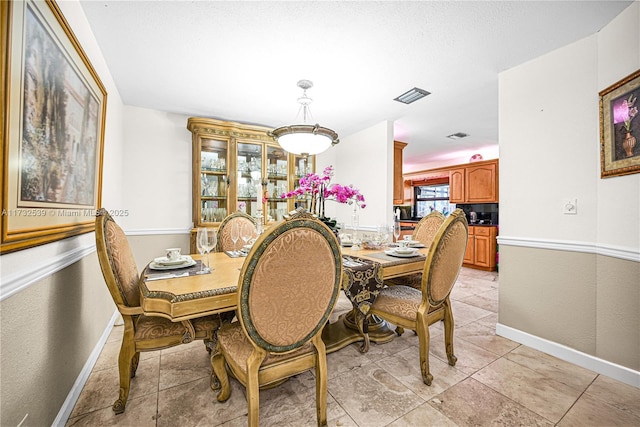 view of tiled dining space