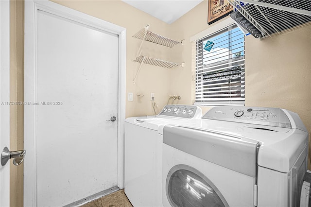 laundry area featuring washer and clothes dryer