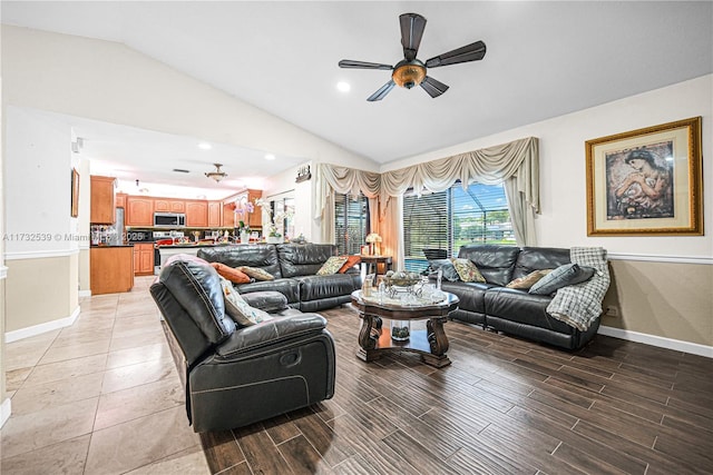 living room featuring lofted ceiling and ceiling fan