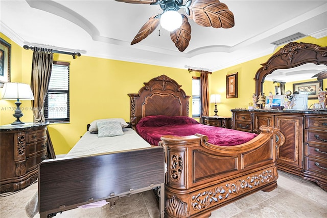 bedroom with crown molding, ceiling fan, a tray ceiling, and multiple windows