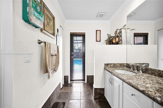 510 NW 105th Dr, Coral Springs, FL 33071 - bathroom featuring crown molding, visible vents, stone tile floors, and a healthy amount of sunlight