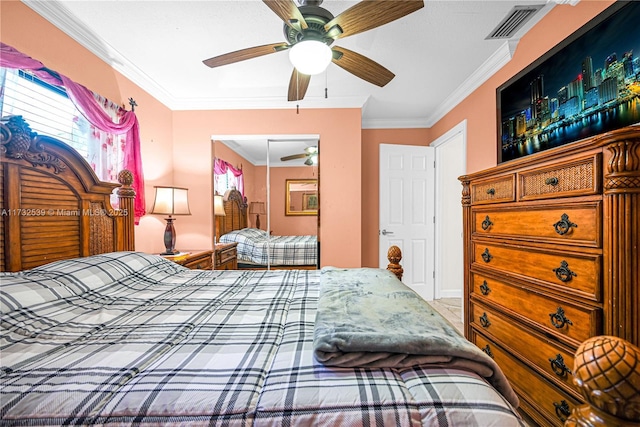 bedroom with crown molding and ceiling fan