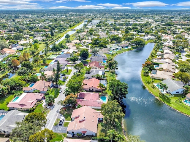 drone / aerial view with a water view