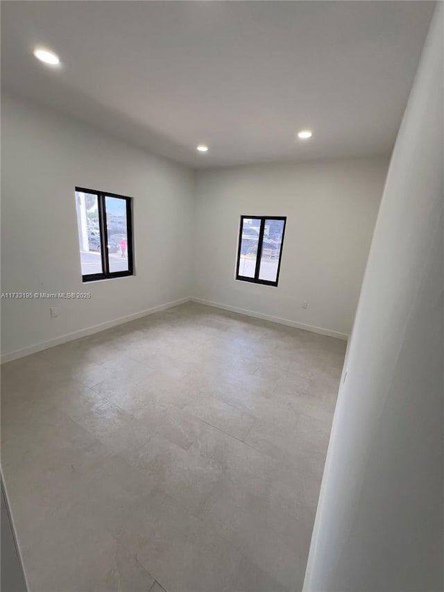 unfurnished room with a wealth of natural light