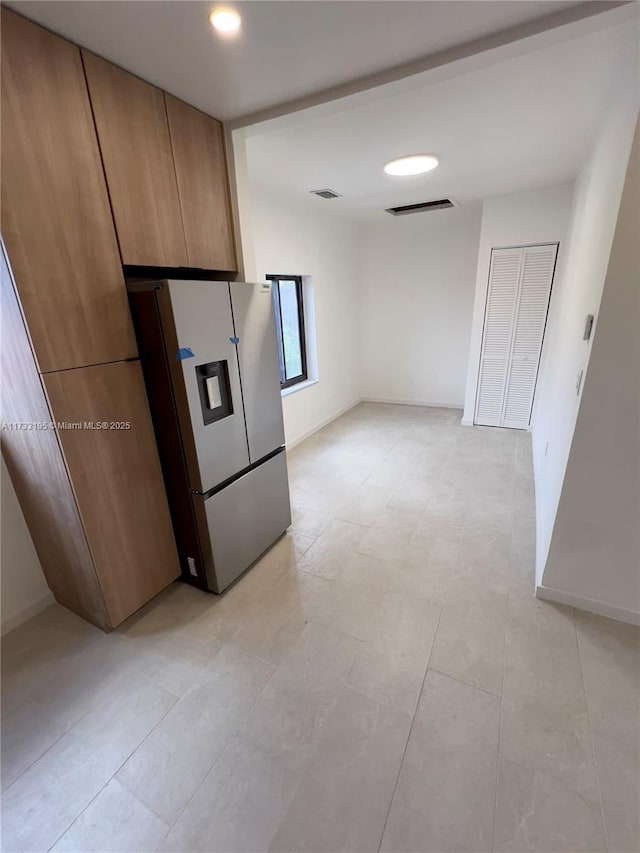 kitchen with stainless steel fridge