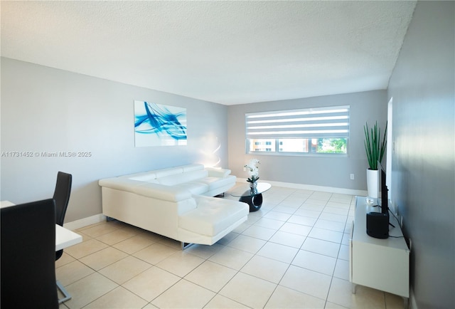 tiled bedroom with a textured ceiling