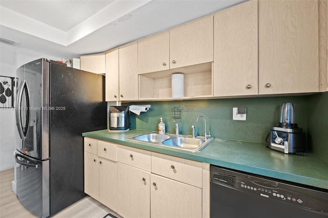 kitchen featuring a sink, open shelves, freestanding refrigerator, light wood finished floors, and dishwasher