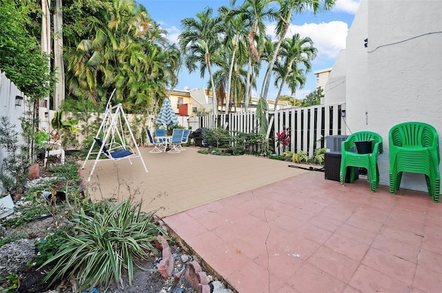 view of patio / terrace with outdoor dining area and fence