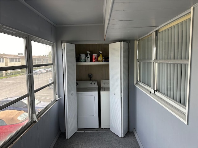 laundry area with independent washer and dryer