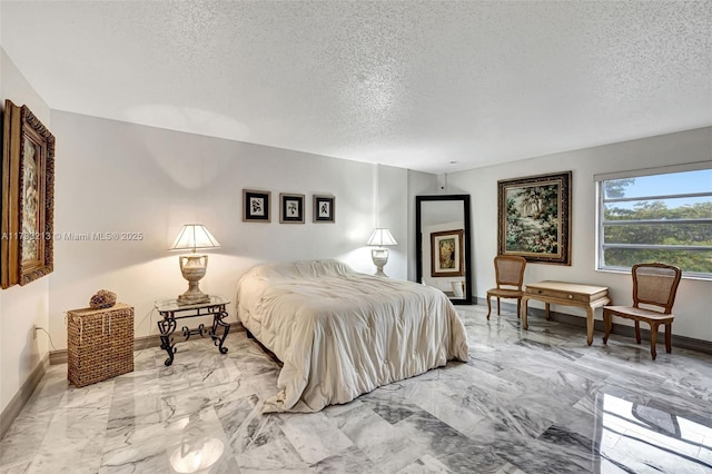 bedroom featuring a textured ceiling