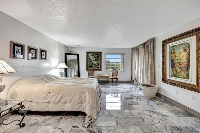 bedroom with a textured ceiling