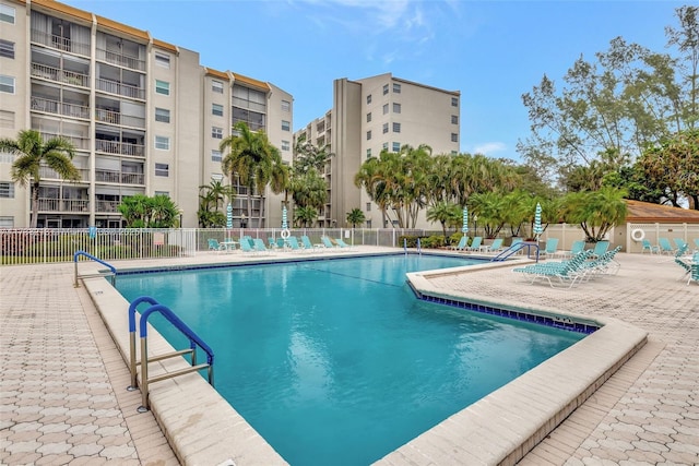 view of swimming pool with a patio area