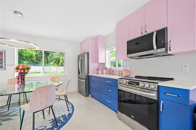 kitchen with stainless steel appliances and blue cabinets