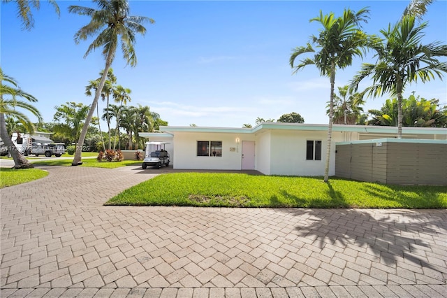 view of front of home with a front yard