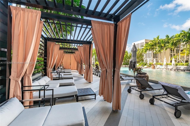 view of patio with a pool, an outdoor hangout area, and a pergola