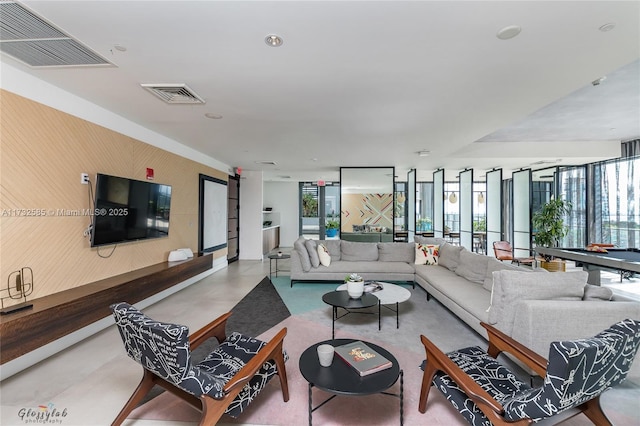 living room featuring a wealth of natural light