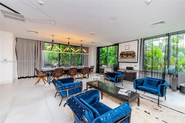 living room with a wall of windows