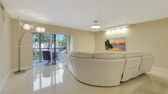 living room with light tile patterned flooring