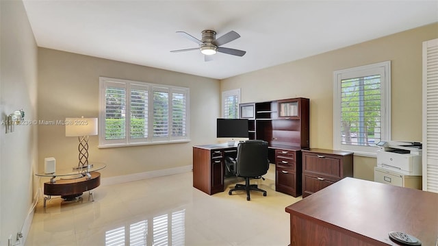 home office with ceiling fan and light tile patterned flooring