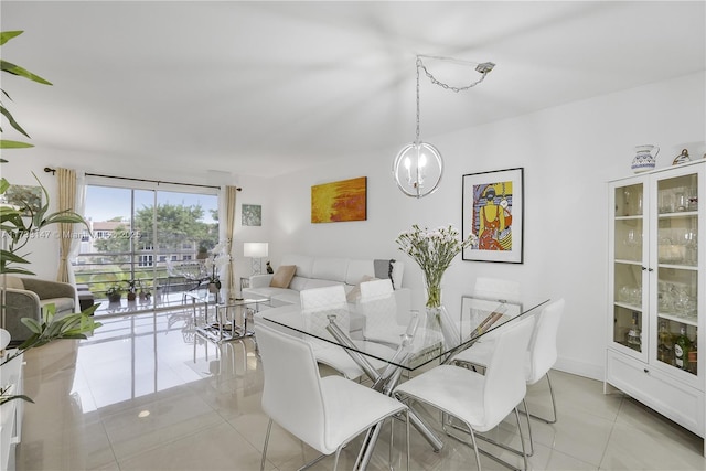 dining room with a chandelier and light tile patterned flooring