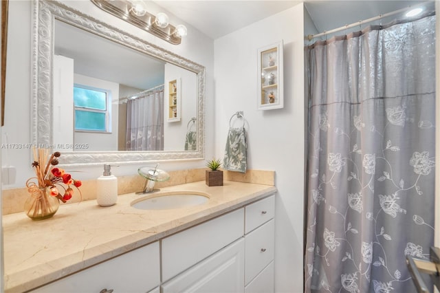 bathroom featuring vanity and a shower with curtain