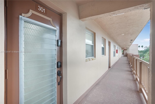 entrance to property with a balcony