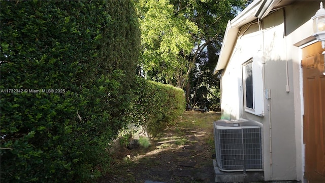 exterior space with central air condition unit